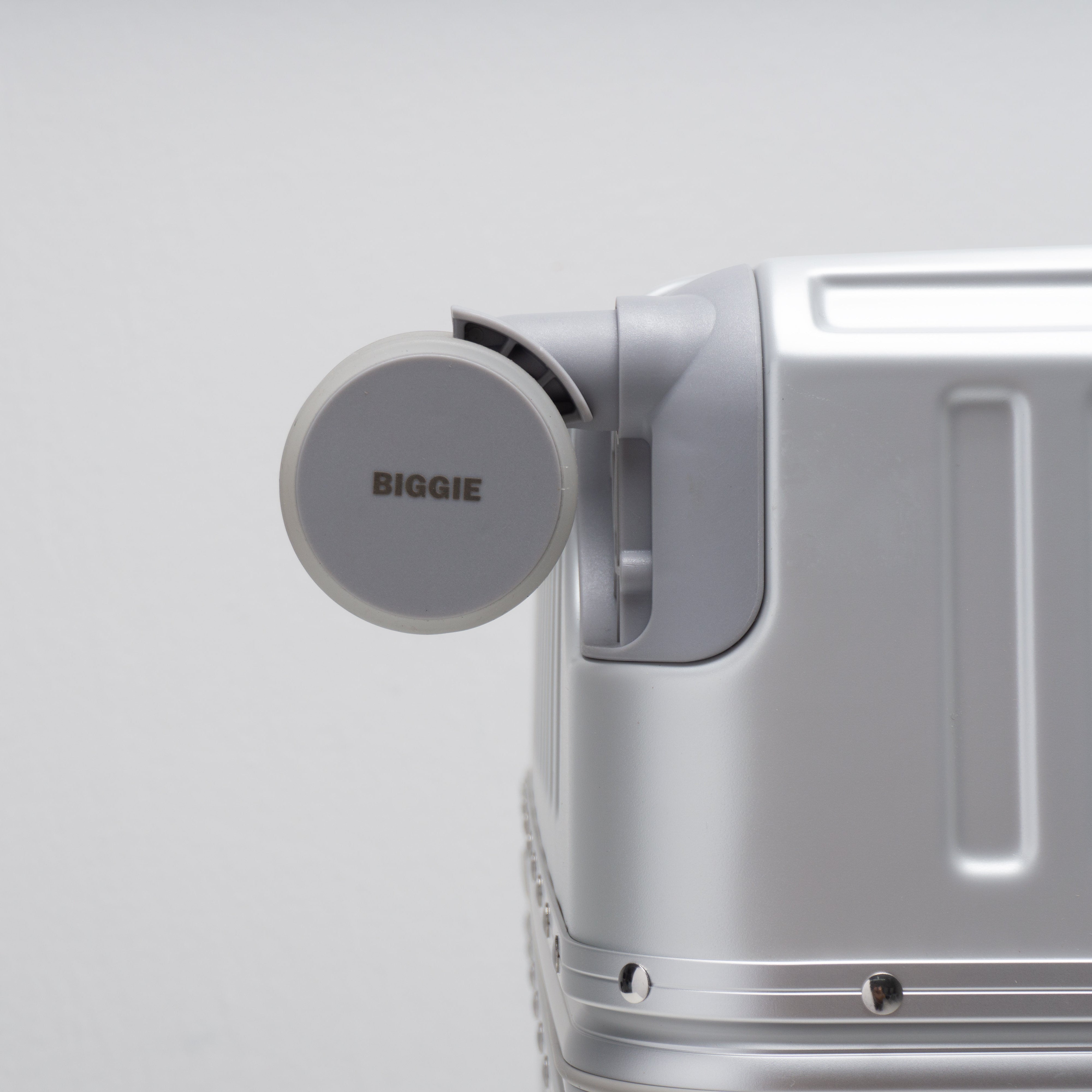 Spinner, luggage wheels showcasing the biggie brand name